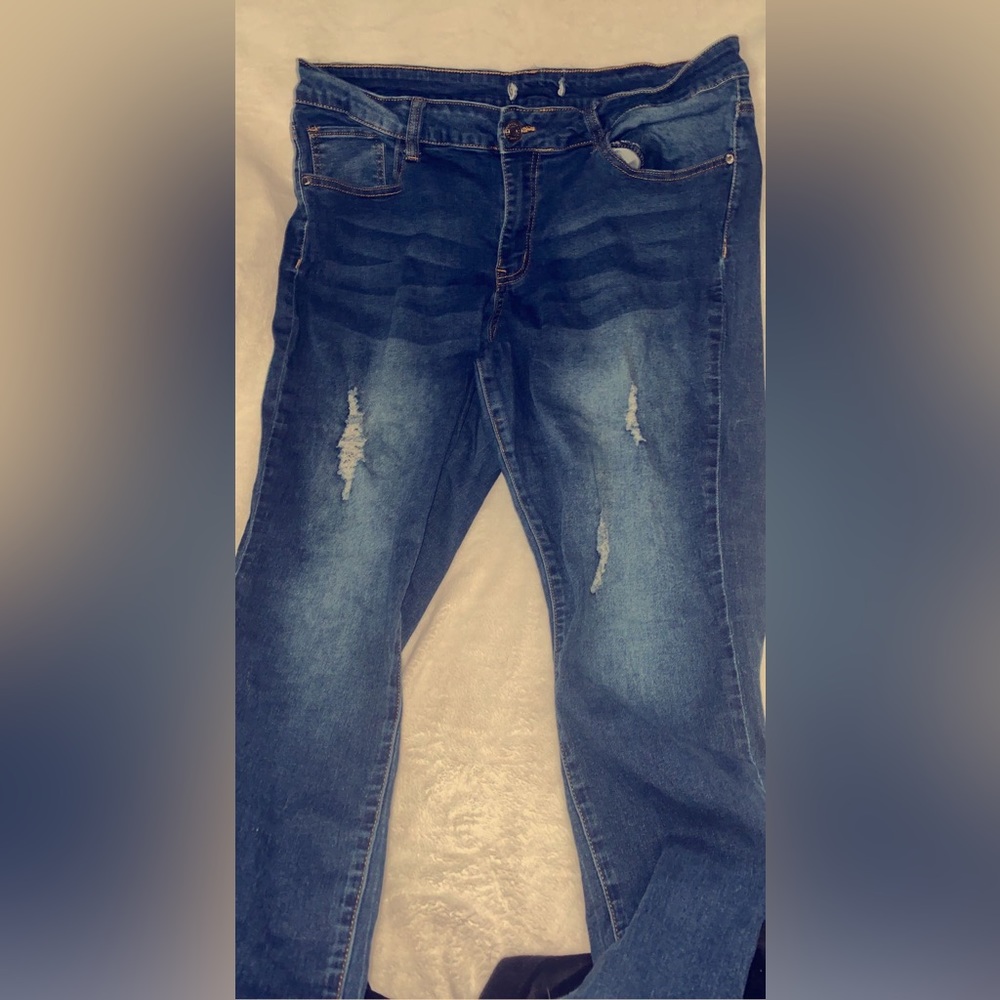 Ripped blue jeans